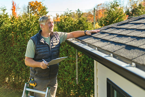Professional Roofing technician working in Monroe, IA